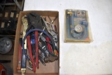 AC charging kit, assortment of pliers, crescent wrenches, vise grips