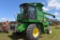 John Deere 7720 Titan II Combine, 5613 Hours,  Straw Chopper, Hydro, Bin Topper 24.5 x 32  Tires, Bi