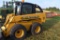 John Deere 260 SKid Loader, Hand/Foot  Controls, Aux. Hydraulics, 14-17.5 Tires,  Heater, A/C, Flip