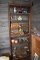 7 Shelf Bookcase With Assortment Of Meat Grinders, Old Tins, Muffin tins, And Knick Knacks