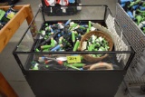 Large Assortment Of Plastic Gardening tools And Nozzles With Wooden Store Display On casters