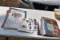Assortment of calendars, posters and newspapers