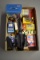 Assortment of playing cards, dice, toys, snap caps