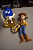 M&M toy and Woody Doll