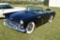 1956 Ford Tbird black with black and white interior, v 12, with hard top and conv top