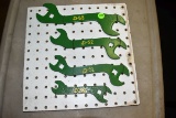 4 John Deere Vintage Wrenches Mounted on Pegboard