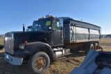 1987 White Volvo Grain Truck, 20' Steel Box &  Hoist, Twin Screw Tandem Axle, Air Brakes,  803,578 M