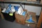 3 Open boxes of booties and hairnets, located building 5