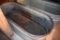 Galvanized water tank has hole, located building 6