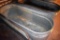 Galvanized water tank has hole, located building 6