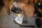 Assortment of shovels, broom, and light fixtures, located building 6