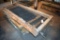 Assorted sizes of wooden framed wire panels, located building 6