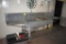 11' Double compartment galvanized sink, hose reel and footbaths , located building 2