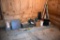 Assortment of rakes, tool box, ceramic tile, poles, located building 6