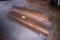 Pile of 1x8 Lumber, located building 2