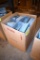 Box full of galvanized hanging feeders, located building 6