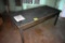 Metal 6' table and metal tubing, located building 7