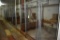 (4) 8'x8' pens, wire panels with steel tubes, wooden bottoms, with some wooden feed boxes,