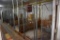 (4) 8'x8' pens, wire panels with steel tubes, wooden bottoms, with some wooden feed boxes