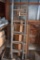 Wooden step ladder 6' and wooden ladder, located building 9