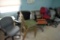 8 office chairs, 2 radios and round stand, located building 5