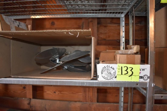 Assortment of fan pulleys and fan blades, located building 5