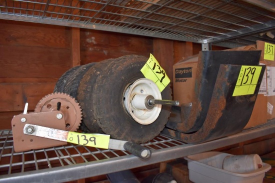 2 trailer fenders, assortment of wheels, hand cable crank, located building 5
