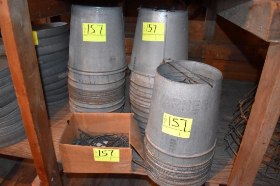 40 steel poultry feeder tops and replacement handles, located building 5