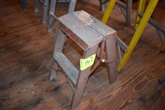 Sears 26" step ladder, located building 5