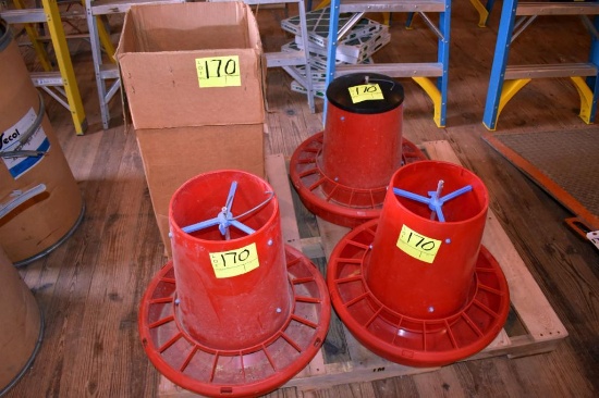 3 plastic poultry feeders and assorted feeder parts, located building 5
