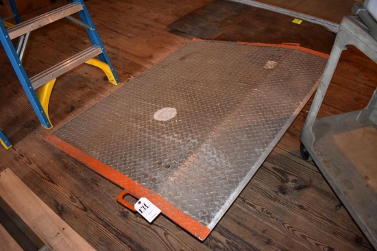Aluminum ramp with 10" rise 48" x 60", located building 5