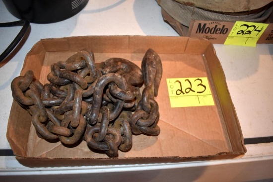 Log chain with 2 hooks, located building 5