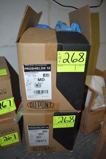 2 open boxes of DuPont size med coveralls, located building 5
