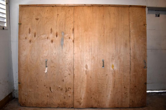 112" x 92" insulated wooden door, located building 1