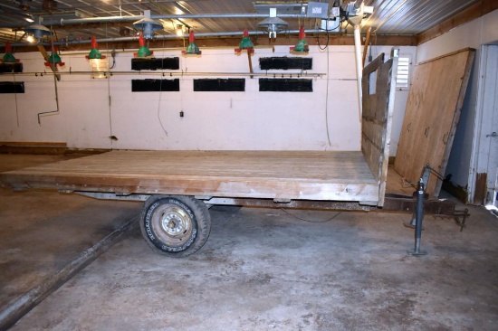 12' x 86" flatbed wooden wagon with single axle running gear, located building 1
