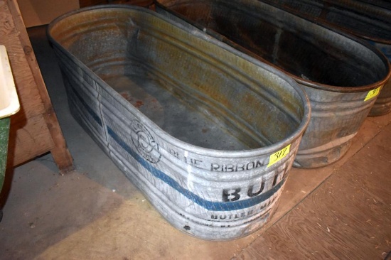 Galvanized water tank has hole, located building 6