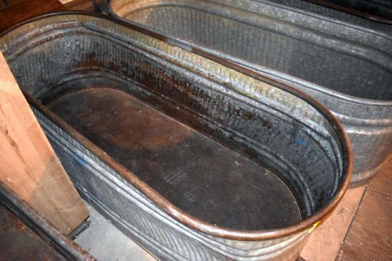 Galvanized water tank has hole, located building 6