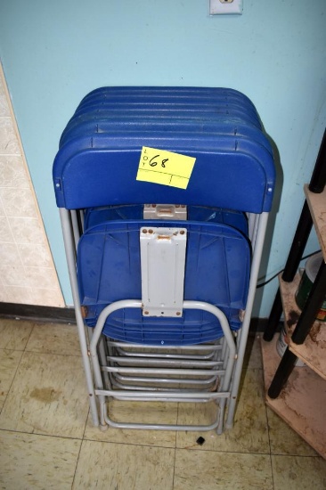 7 Folding chairs, located building 5