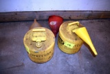 2 safety cans and funnels, located building 1