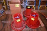 3 plastic poultry feeders and assorted feeder parts, located building 5