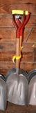 2 aluminum scoop shovels, located building 5