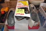 5 Pair of overshoes and Tingley boots sizes XL and L and 2XL, located building 5