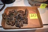 Log chain with 2 hooks, located building 5