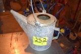 Metal water can, located building 5