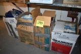 open cases of assorted PPE items, gloves, cover-alls, located building 5
