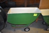 Fiberglass feed cart with solid tires, located building 6