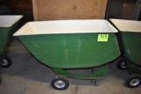 Fiberglass feed cart with solid tires, located building 6