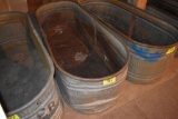 Galvanized water tank has hole, located building 6