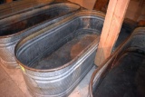 Galvanized water tank has hole, located building 6
