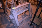 Wooden saw horses, located building 6